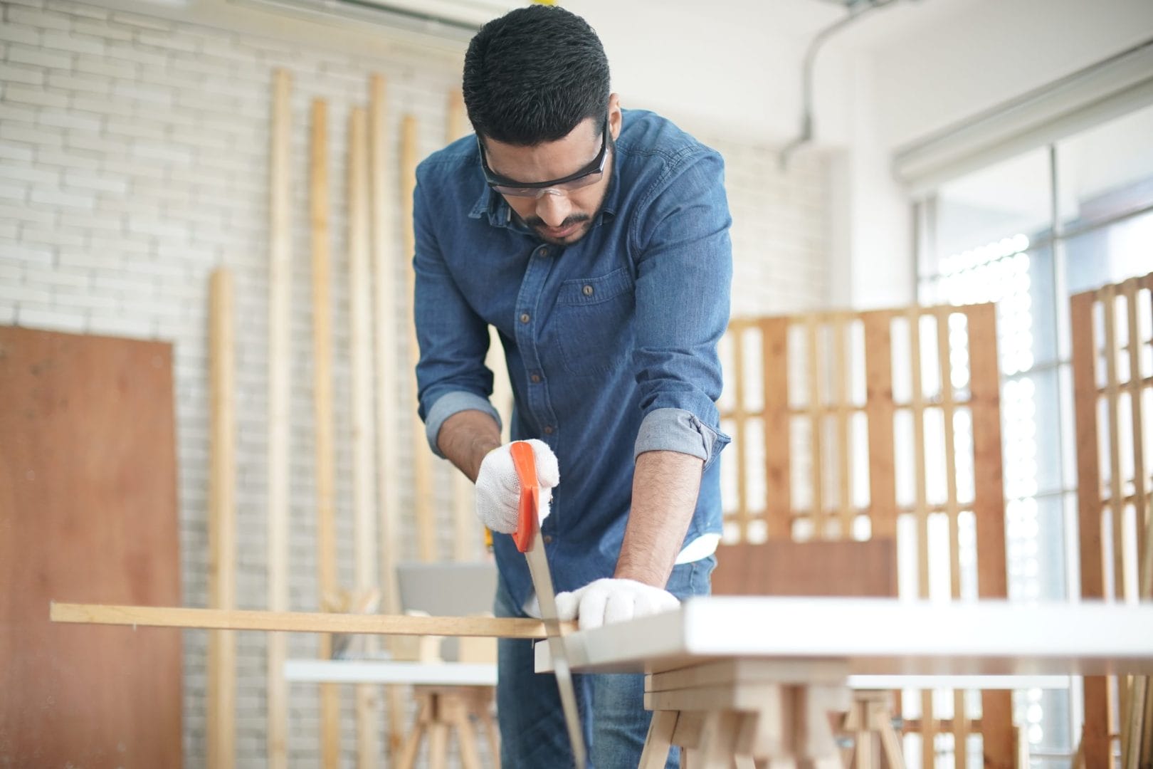carpenter-or-warehouse-worker-choosing-raw-wood-ma-2025-02-03-10-06-03-utc