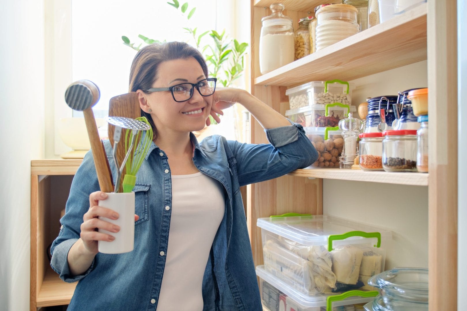 portrait-of-adult-smiling-woman-with-cooking-acces-2024-12-08-03-36-52-utc
